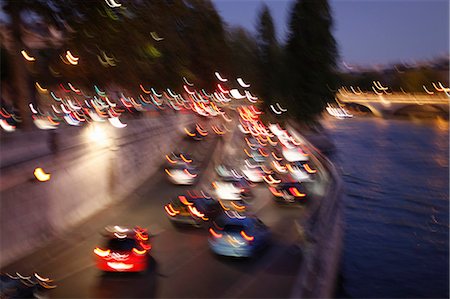 photo of crowd on bridges - Time-lapse view of cars in city center Stock Photo - Premium Royalty-Free, Code: 6122-07702965