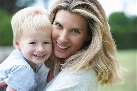 simsearch:6122-07703436,k - Close up of mother and child smiling Stock Photo - Premium Royalty-Free, Code: 6122-07703052