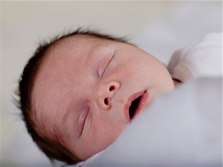 simsearch:614-07031703,k - Close up of infant's sleeping face Stock Photo - Premium Royalty-Free, Code: 6122-07703279