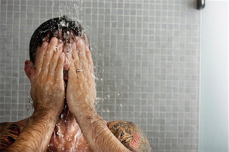 simsearch:614-09110953,k - Man washing his hair in shower Stock Photo - Premium Royalty-Free, Code: 6122-07703391