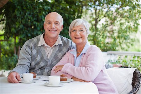 drinking coffee on patio - Older couple having coffee together Stock Photo - Premium Royalty-Free, Code: 6122-07703548