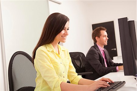 simsearch:614-06718619,k - Business people at work in office Stock Photo - Premium Royalty-Free, Code: 6122-07703849