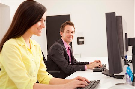 simsearch:614-06718619,k - Business people at work in office Stock Photo - Premium Royalty-Free, Code: 6122-07703850