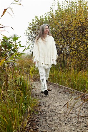 denmark park - Older woman walking in park Stock Photo - Premium Royalty-Free, Code: 6122-07703868