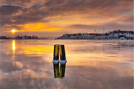 finland winter - Sun setting over urban pier Photographie de stock - Premium Libres de Droits, Code: 6122-07703956