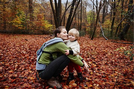 simsearch:649-06622509,k - Mother and son in autumn leaves Stock Photo - Premium Royalty-Free, Code: 6122-07704242
