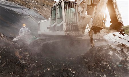 pollution - Digger at garbage collection center Stock Photo - Premium Royalty-Free, Code: 6122-07704715