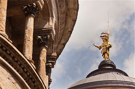 Gold statue on domed roof of cathedral Stock Photo - Premium Royalty-Free, Code: 6122-07705496
