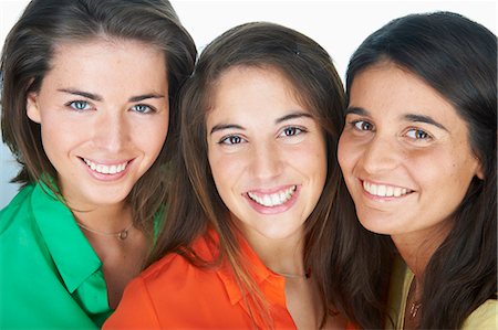 studio portrait above woman - Group of women smiling together Stock Photo - Premium Royalty-Free, Code: 6122-07705661