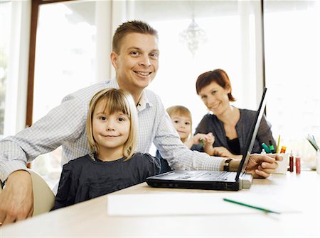 simsearch:6108-06167572,k - Father and daughter using laptop Stock Photo - Premium Royalty-Free, Code: 6122-07706022