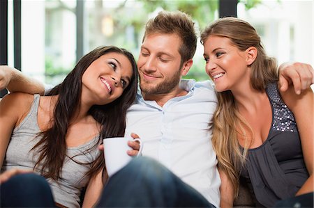 simsearch:649-06040125,k - Friends having coffee together on sofa Stock Photo - Premium Royalty-Free, Code: 6122-07706150