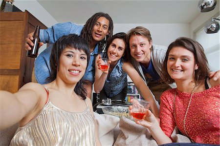 simsearch:649-06112949,k - Friends taking pictures of themselves Stock Photo - Premium Royalty-Free, Code: 6122-07706833