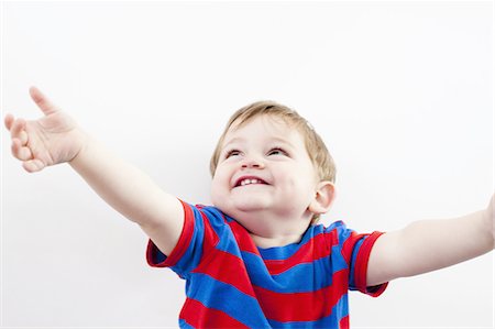 Close up of toddler boy laughing Stockbilder - Premium RF Lizenzfrei, Bildnummer: 6122-07706964