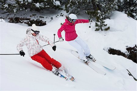 snow image friend - Skiers coasting on snowy slope Stock Photo - Premium Royalty-Free, Code: 6122-07707284