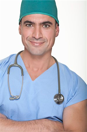 simsearch:6122-07707366,k - Smiling surgeon wearing stethoscope Foto de stock - Sin royalties Premium, Código: 6122-07707368
