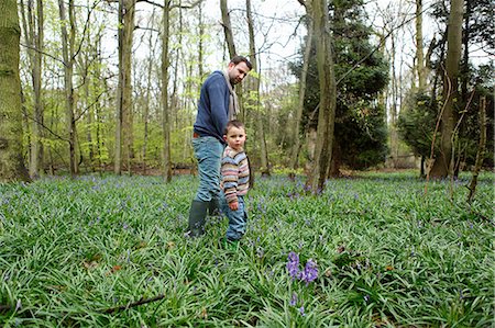 simsearch:6122-08212235,k - Father and son walking in forest Stock Photo - Premium Royalty-Free, Code: 6122-07707300