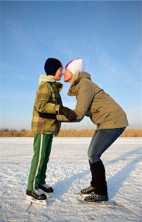 Mother and son touching noses on ice Stock Photo - Premium Royalty-Free, Code: 6122-07707476