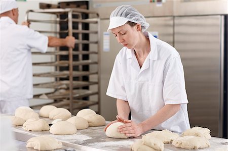 freshly baked bread - Chef baking in kitchen Stock Photo - Premium Royalty-Free, Code: 6122-07707496