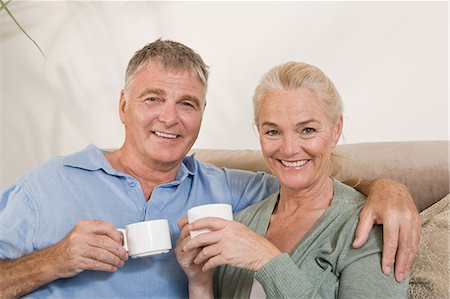 simsearch:6122-07697023,k - Couple with cups of coffee Stock Photo - Premium Royalty-Free, Code: 6122-08212480