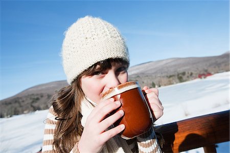 Girl drinking hot drink, portrait Stock Photo - Premium Royalty-Free, Code: 6122-08212415