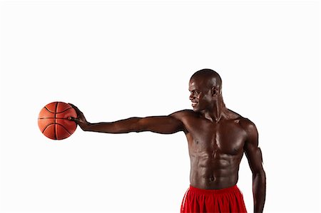 simsearch:632-01145022,k - Man holding basketball Foto de stock - Sin royalties Premium, Código: 6122-08229031