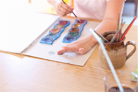 simsearch:6108-05872632,k - Girl finger-painting with watercolors Stock Photo - Premium Royalty-Free, Code: 6122-08229555