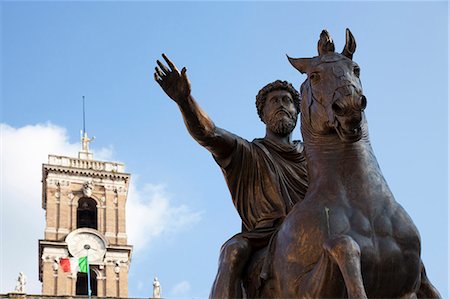 Ancient statues and clock tower Stock Photo - Premium Royalty-Free, Code: 6122-08229816