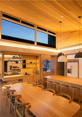 simsearch:6124-08170708,k - Illuminated wood ceiling over kitchen and dining table Stock Photo - Premium Royalty-Free, Code: 6124-08170698