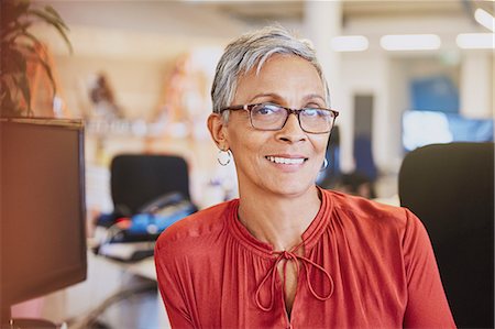 female front shot - Portrait smiling businesswoman Stock Photo - Premium Royalty-Free, Code: 6124-08768361