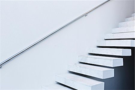 simsearch:6124-08907887,k - White, modern, minimalist floating staircase Stock Photo - Premium Royalty-Free, Code: 6124-08907993