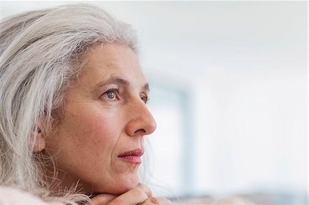 simsearch:6122-07707117,k - Close up serious, pensive mature woman looking away Stock Photo - Premium Royalty-Free, Code: 6124-08907902