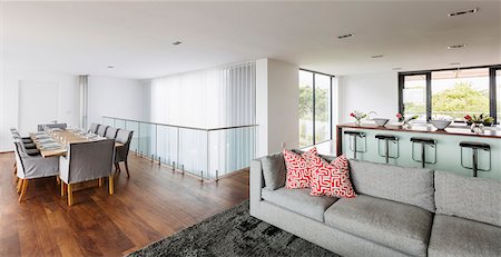 Luxury home showcase interior dining room, living room and kitchen open plan Foto de stock - Sin royalties Premium, Código: 6124-08907936