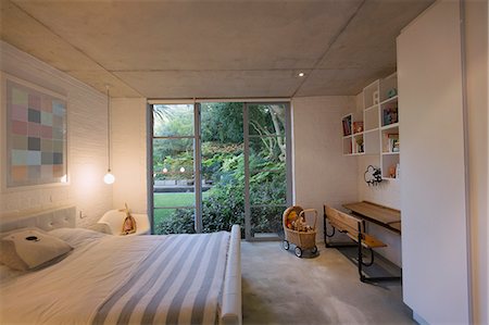 simsearch:6124-08170700,k - Home showcase interior child’s bedroom open to garden Photographie de stock - Premium Libres de Droits, Code: 6124-08908077