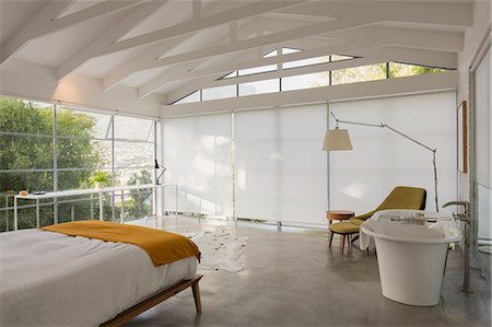 simsearch:6113-08722099,k - Modern, minimalist home showcase interior bedroom with vaulted ceiling Stock Photo - Premium Royalty-Free, Code: 6124-08908034