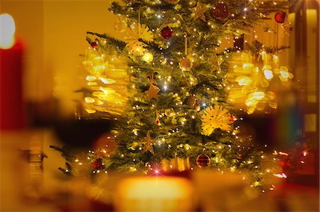 simsearch:6124-08926935,k - Illuminated Christmas tree with ornaments and string lights Stock Photo - Premium Royalty-Free, Code: 6124-08926961