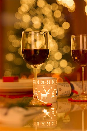 simsearch:6124-08926935,k - Red wine and Christmas candle on dining table Stock Photo - Premium Royalty-Free, Code: 6124-08926900