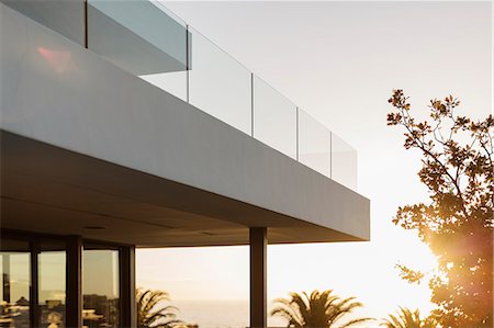 simsearch:6124-08908189,k - Balcony of modern luxury home showcase exterior at sunset Stock Photo - Premium Royalty-Free, Code: 6124-08927042