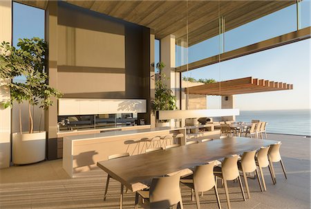 simsearch:632-08886818,k - Sunny modern, luxury home showcase interior dining table with ocean view Foto de stock - Sin royalties Premium, Código: 6124-09099808