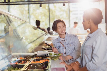 simsearch:6124-09004874,k - Young lesbian couple at salad bar in market Stock Photo - Premium Royalty-Free, Code: 6124-09004794