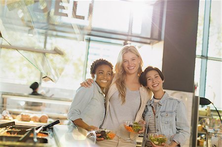 simsearch:6124-09004857,k - Portrait smiling young women enjoying salad bar at grocery store market Stock Photo - Premium Royalty-Free, Code: 6124-09004809