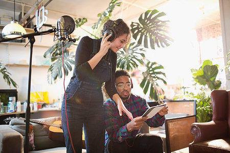 simsearch:6113-09168289,k - Young man and woman recording music in apartment Stock Photo - Premium Royalty-Free, Code: 6124-09188535