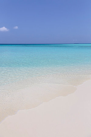 sunlight beach - Tranquil, sunny blue ocean beach, Maldives, Indian Ocean Stock Photo - Premium Royalty-Free, Code: 6124-09188681