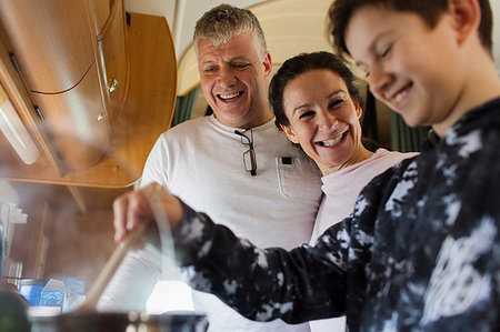 Family cooking in motor home Stock Photo - Premium Royalty-Free, Code: 6124-09188850