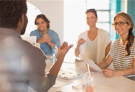 simsearch:6113-07565913,k - Smiling creative business people brainstorming in conference room meeting Foto de stock - Sin royalties Premium, Código: 6124-09130985