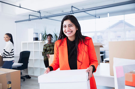 simsearch:649-07280669,k - Portrait confident businesswoman moving into new office Stock Photo - Premium Royalty-Free, Code: 6124-09269799