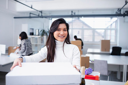 simsearch:649-07280669,k - Portrait confident businesswoman moving into new office Stock Photo - Premium Royalty-Free, Code: 6124-09269891
