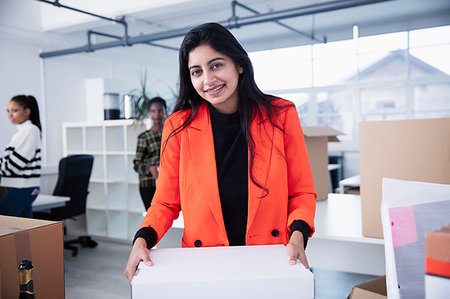 simsearch:649-07280669,k - Portrait confident businesswoman moving into new office Stock Photo - Premium Royalty-Free, Code: 6124-09269913