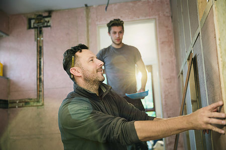 restoration equipment - Construction workers framing inside of house Stock Photo - Premium Royalty-Free, Code: 6124-09229049