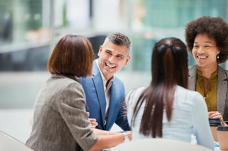 simsearch:6124-09229117,k - Business people laughing in meeting Stock Photo - Premium Royalty-Free, Code: 6124-09229145