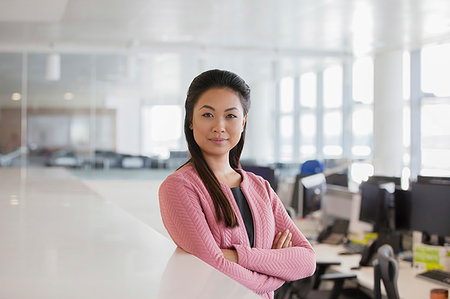 simsearch:6113-08521456,k - Portrait confident, ambitious businesswoman in office Stock Photo - Premium Royalty-Free, Code: 6124-09229133